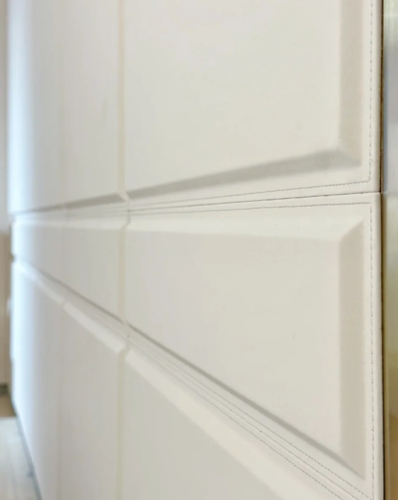 Leather — wrapped & stitched panels