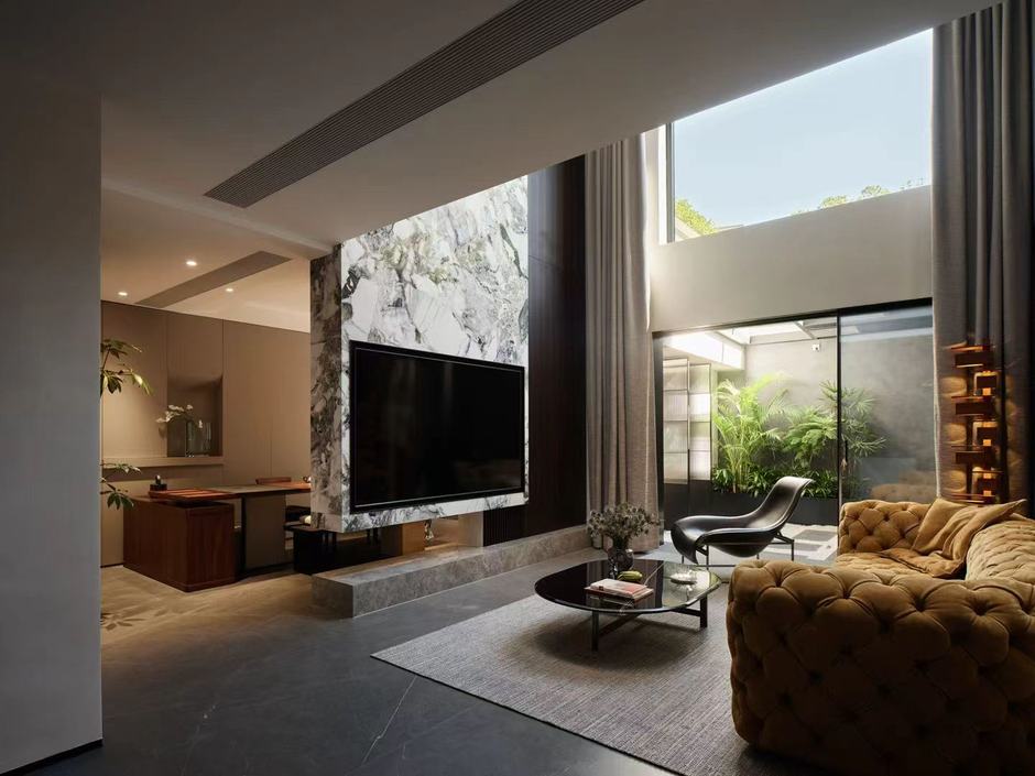 Double-height living — integrated display shelving