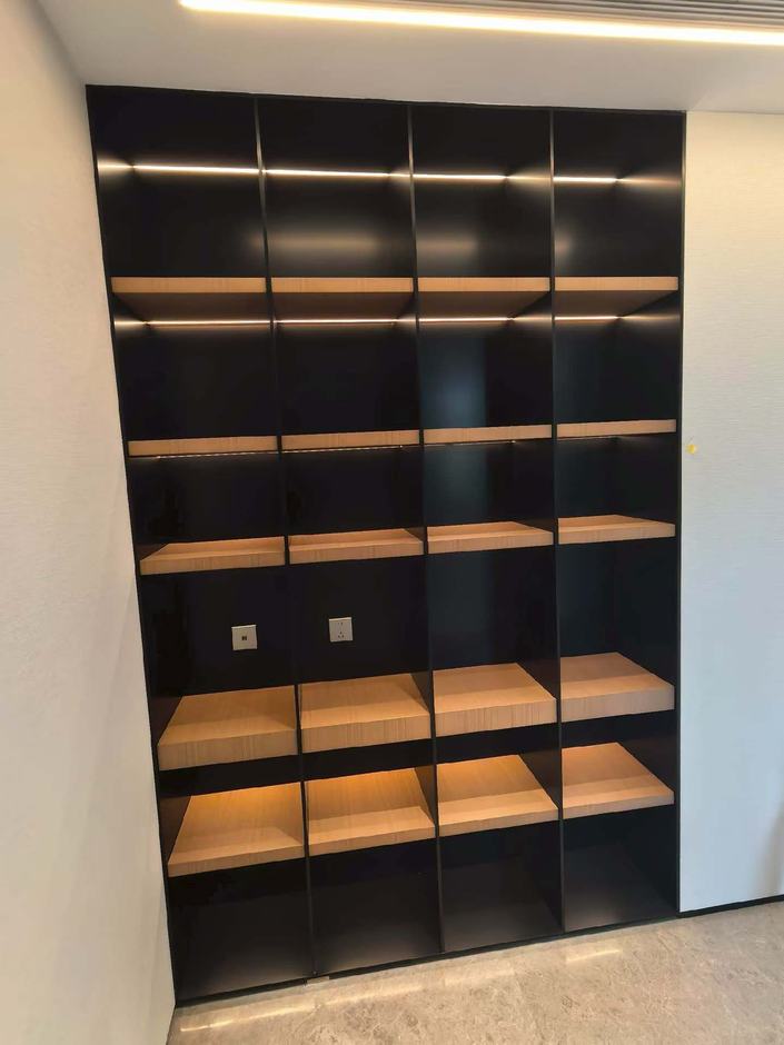 Illuminated display wall — fumed oak & black